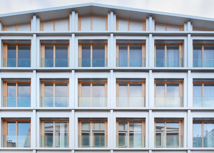 Conversión de un aparcamiento en una residencia de viviendas sociales por NZI Architectes. Fotografía por Frédéric Delangle