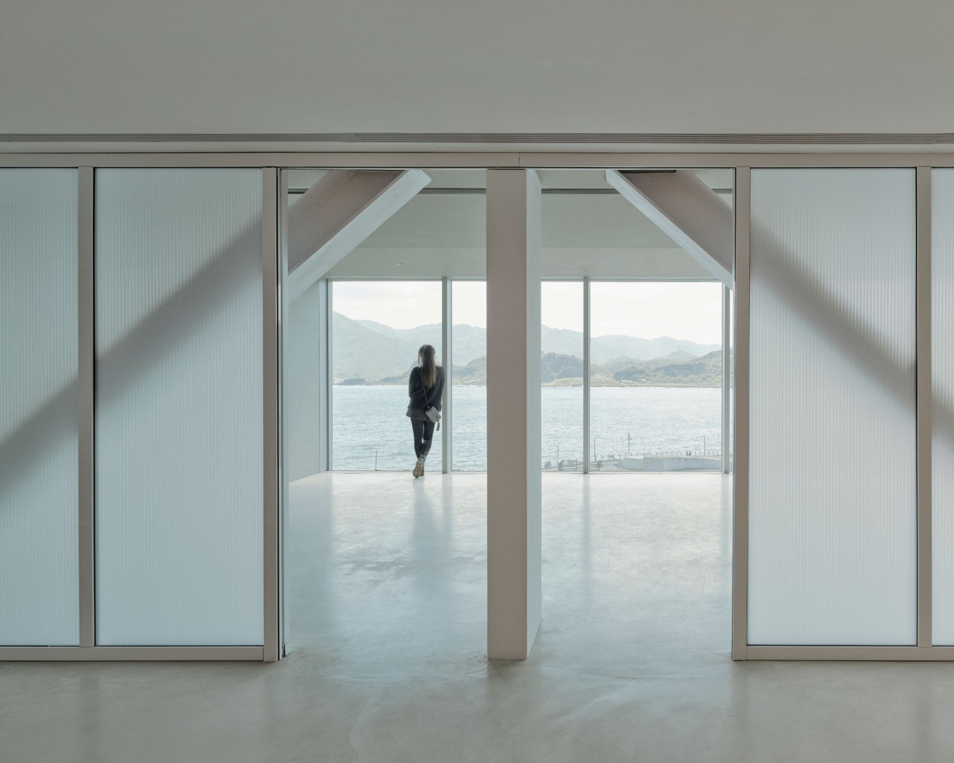 Renovated fourth floor sky bridge. i Ocean Museum by B+P Architects. Photograph by Studio Millspace.