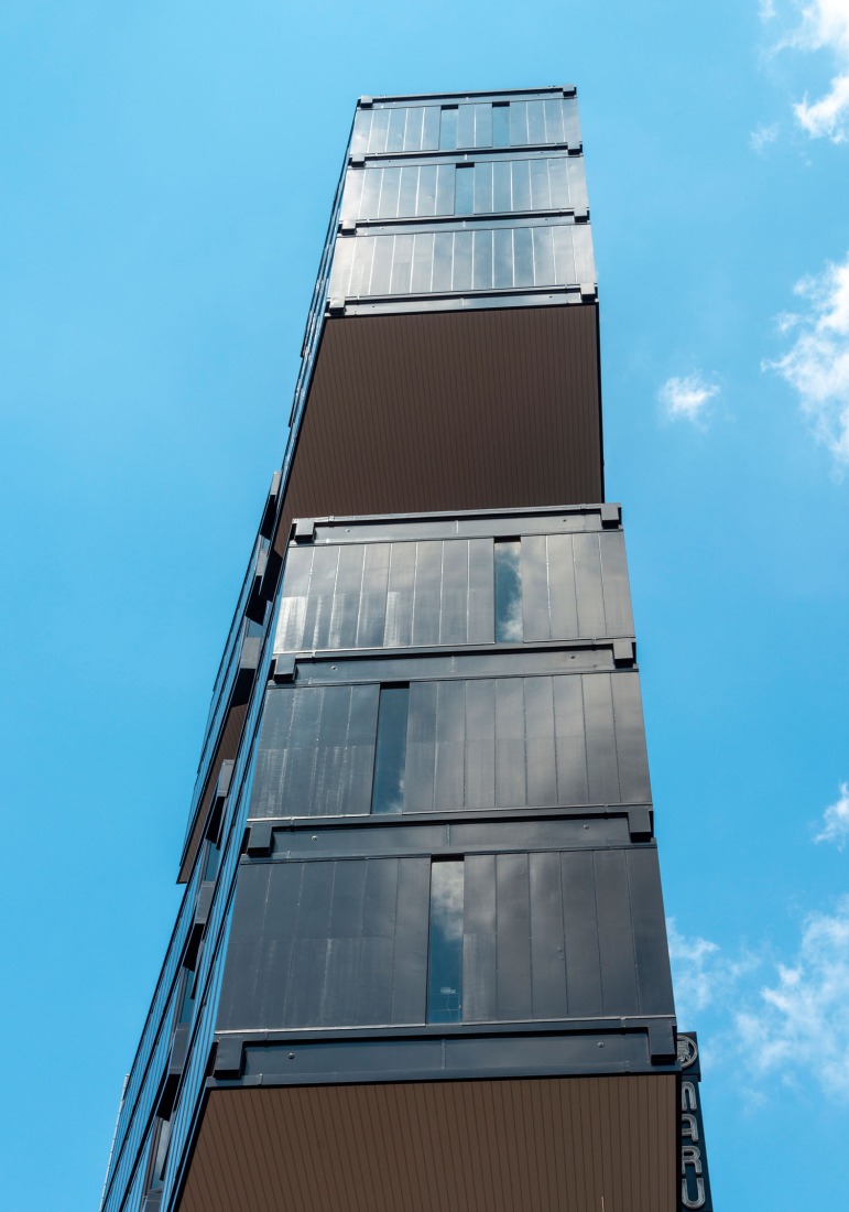 Kenzo Tange's Shizuoka Press and Broadcasting Center, renovated by TAISEI. South Exterior Looking up. Photograph by Naoki Kumagai Photo Office, Inc.