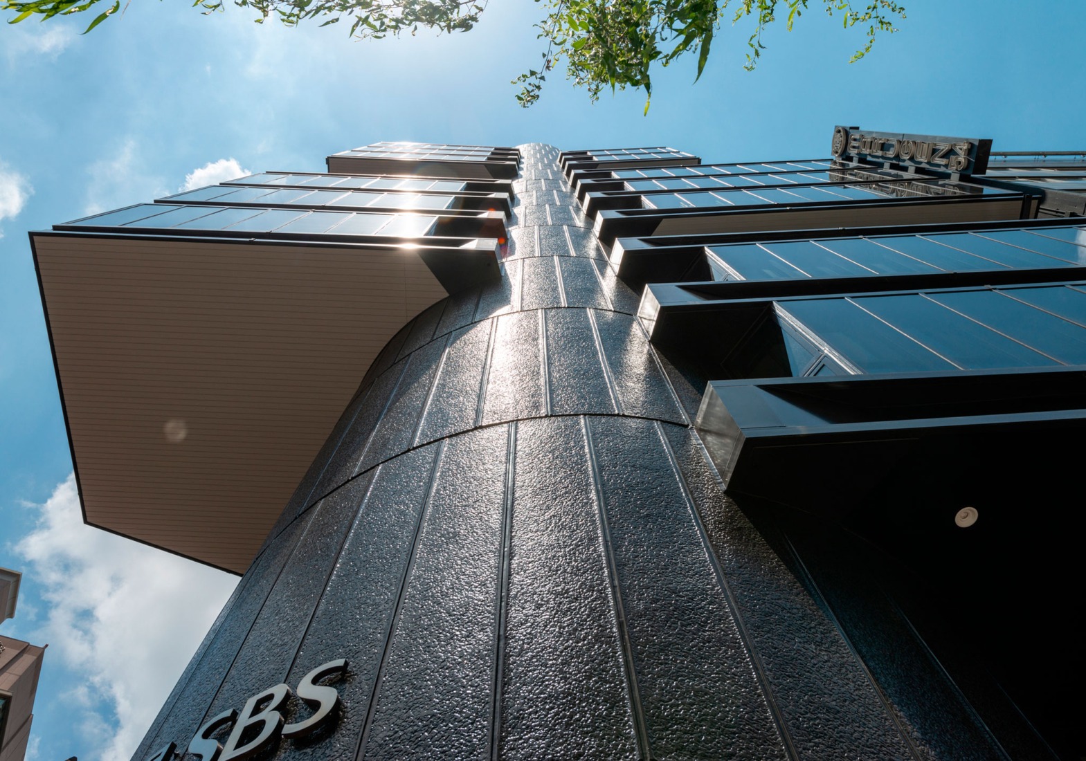 Kenzo Tange's Shizuoka Press and Broadcasting Center, renovated by TAISEI. East Exterior Looking up. Photograph by Naoki Kumagai Photo Office, Inc.