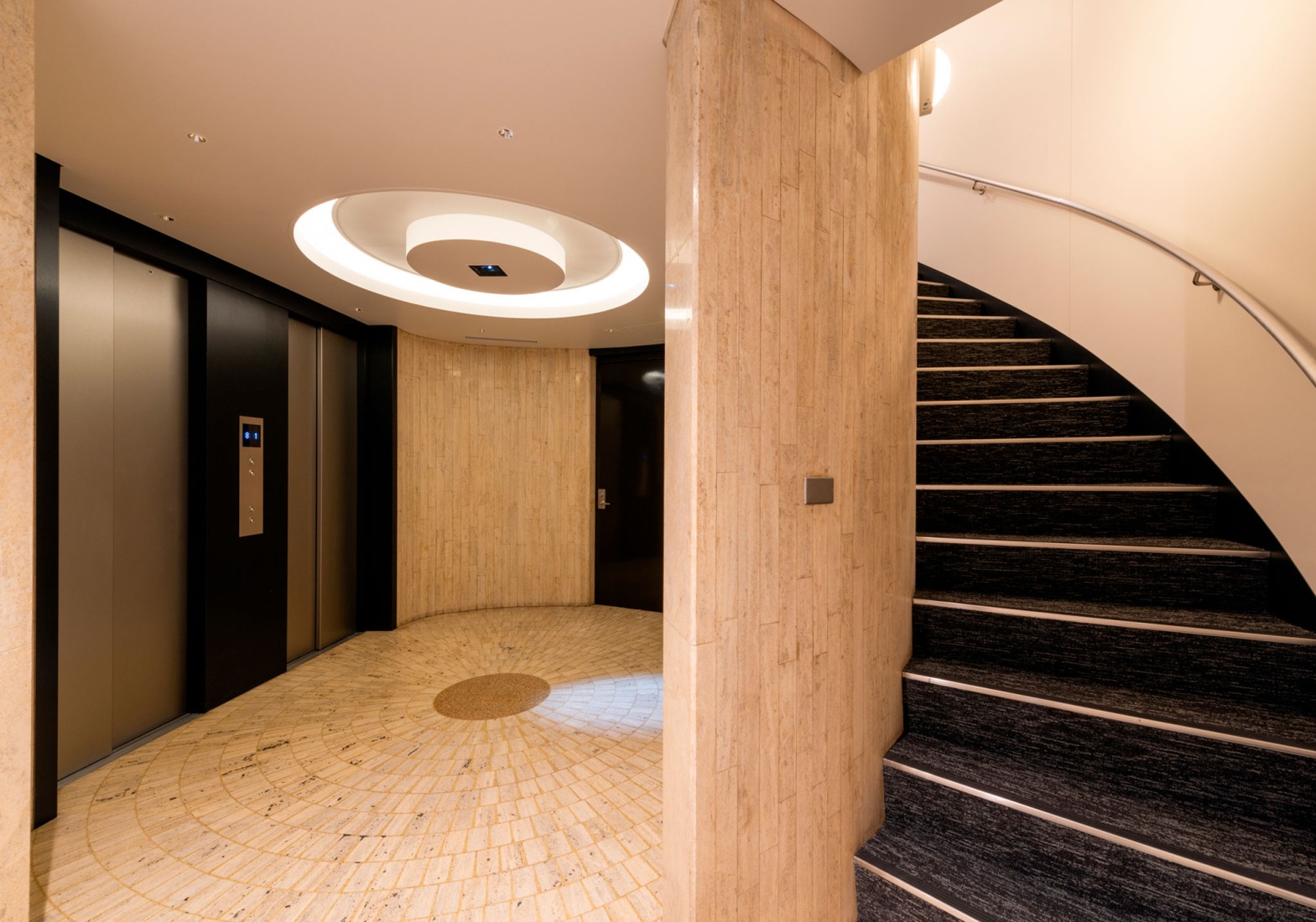 Kenzo Tange's Shizuoka Press and Broadcasting Center, renovated by TAISEI. 1F Elevator hall. Photograph by Naoki Kumagai Photo Office, Inc.