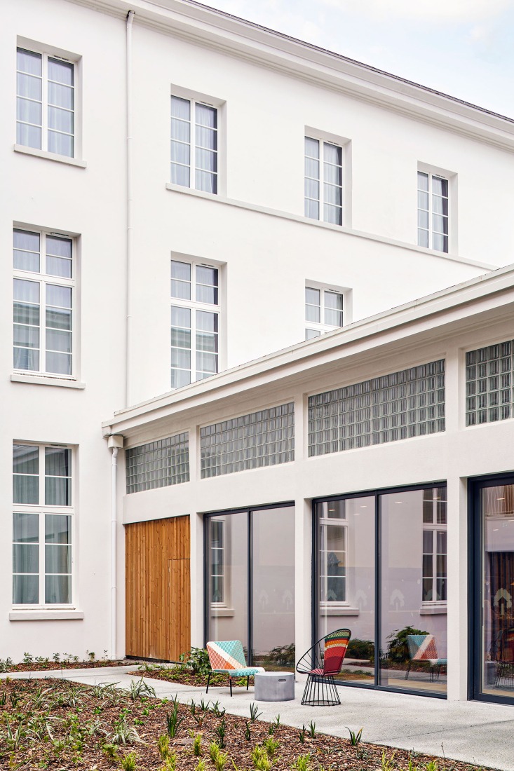 Renovation of a historic post office by Chatillon Architectes. Photograph by Antoine Mercusot.