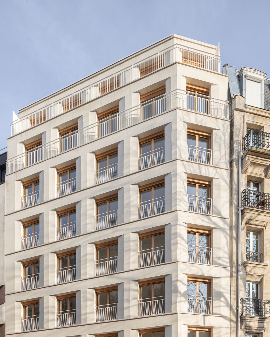 15 housing units in solid stone, timber and hemp concrete by MAO Architectes. Photograph by Cyrille Lallement.