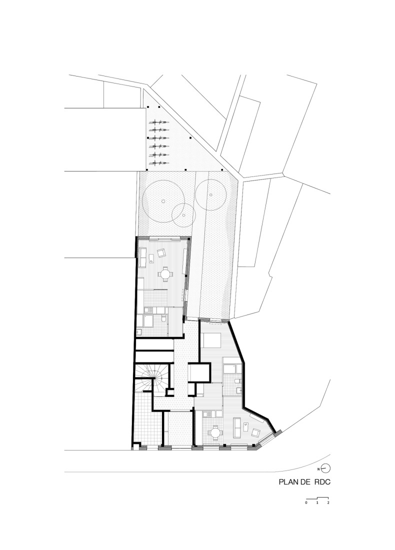 Ground floor plan. 15 housing units in solid stone, timber and hemp concrete by MAO Architectes.