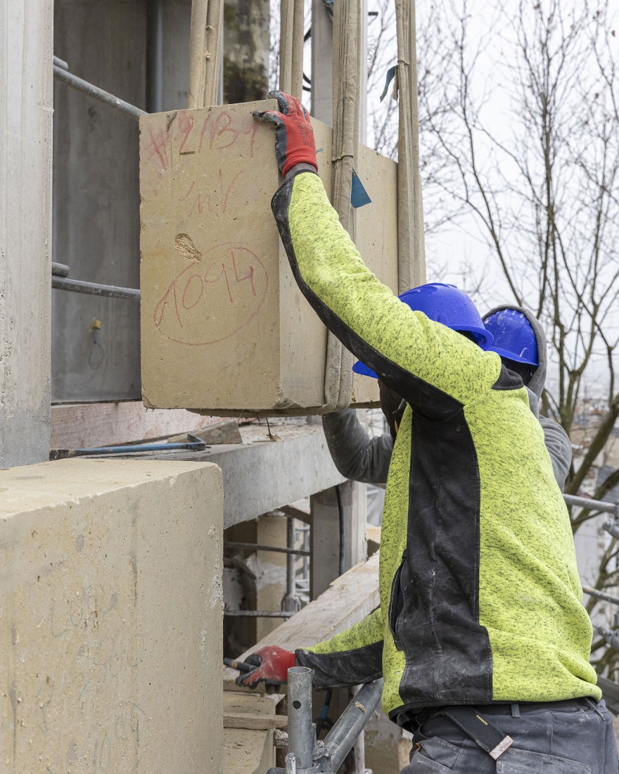 Construction. 15 housing units in solid stone, timber and hemp concrete by MAO Architectes. Photograph by Cyrille Lallement.