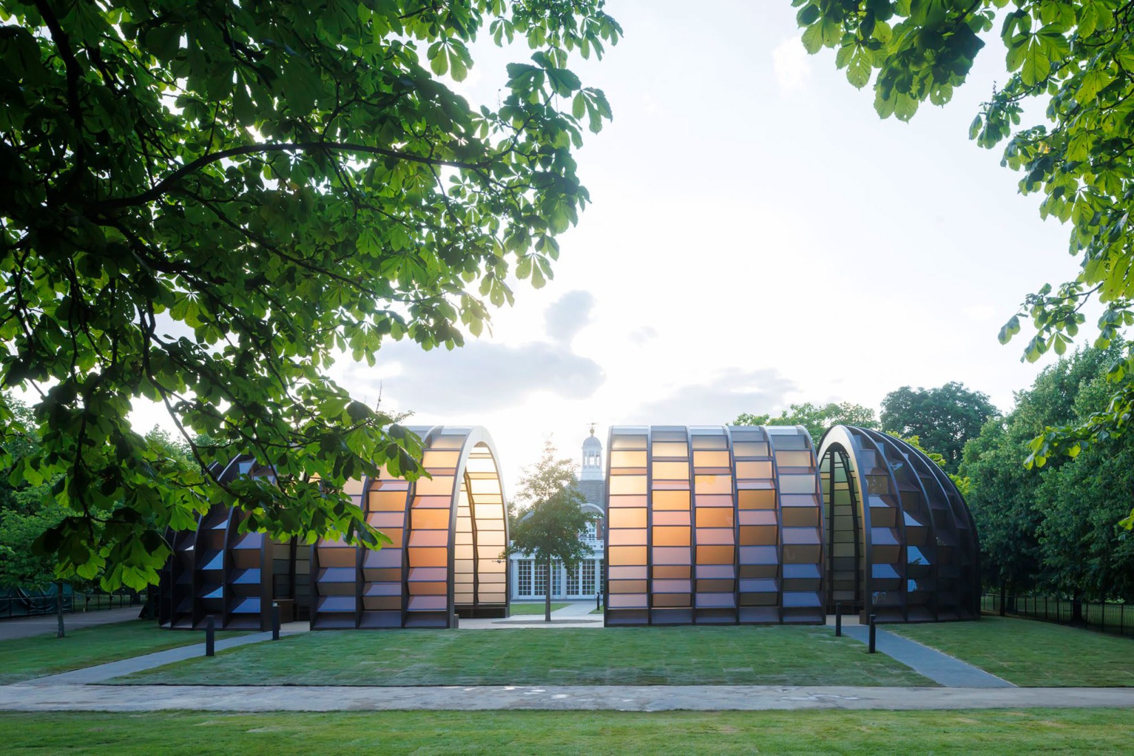 Exterior view. Serpentine Pavilion 2025. A Capsule in Time, by Marina Tabassum, Marina Tabassum Architects (MTA). Photograph by Iwan Baan. Courtesy of Serpentine.