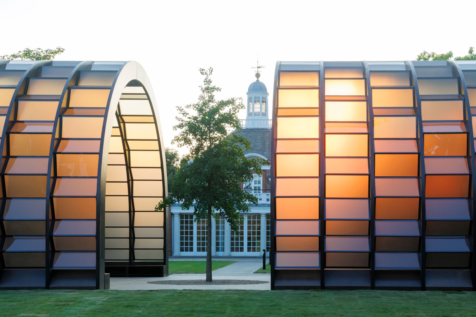 Exterior view. Serpentine Pavilion 2025. A Capsule in Time, by Marina Tabassum, Marina Tabassum Architects (MTA). Photograph by Iwan Baan. Courtesy of Serpentine.