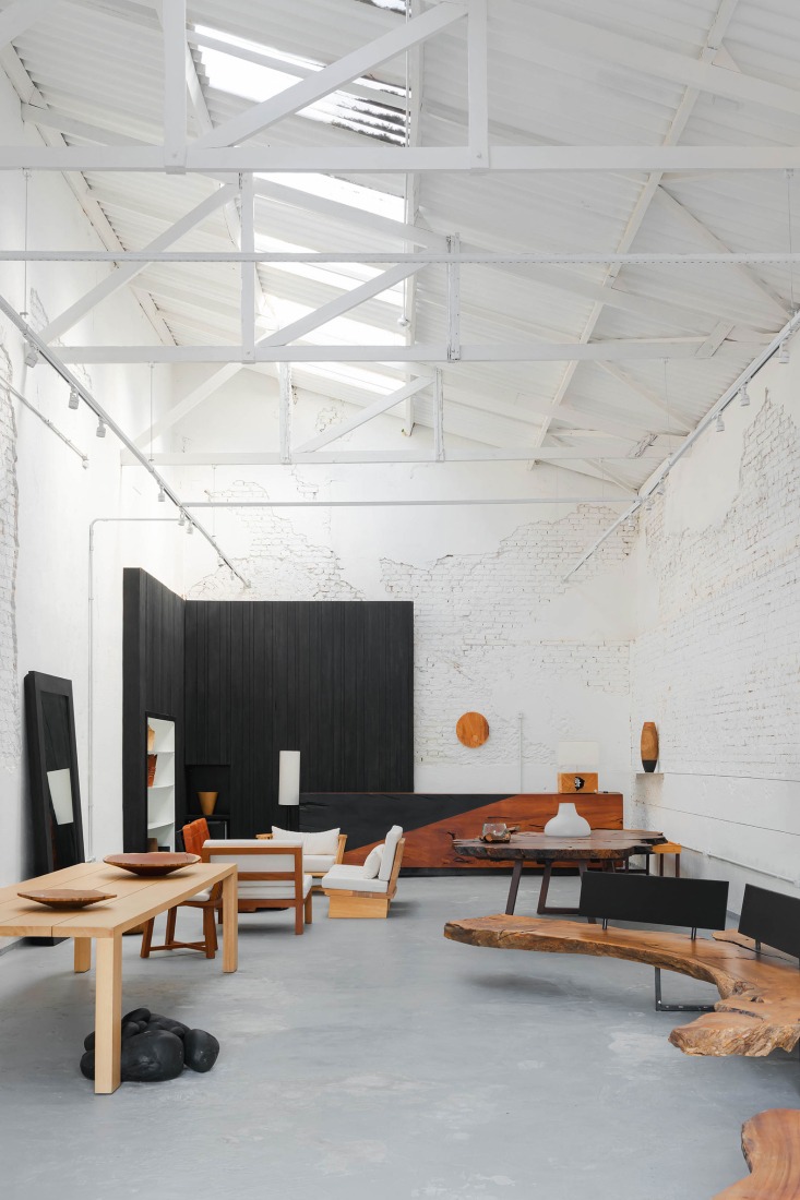 Interior view of the Atelier D, featuring the furniture designed by Pedro Petry. Fábrica de Arte Marcos Amaro (FAMA) by KAAN. Photograph by Sebastian van Damme.