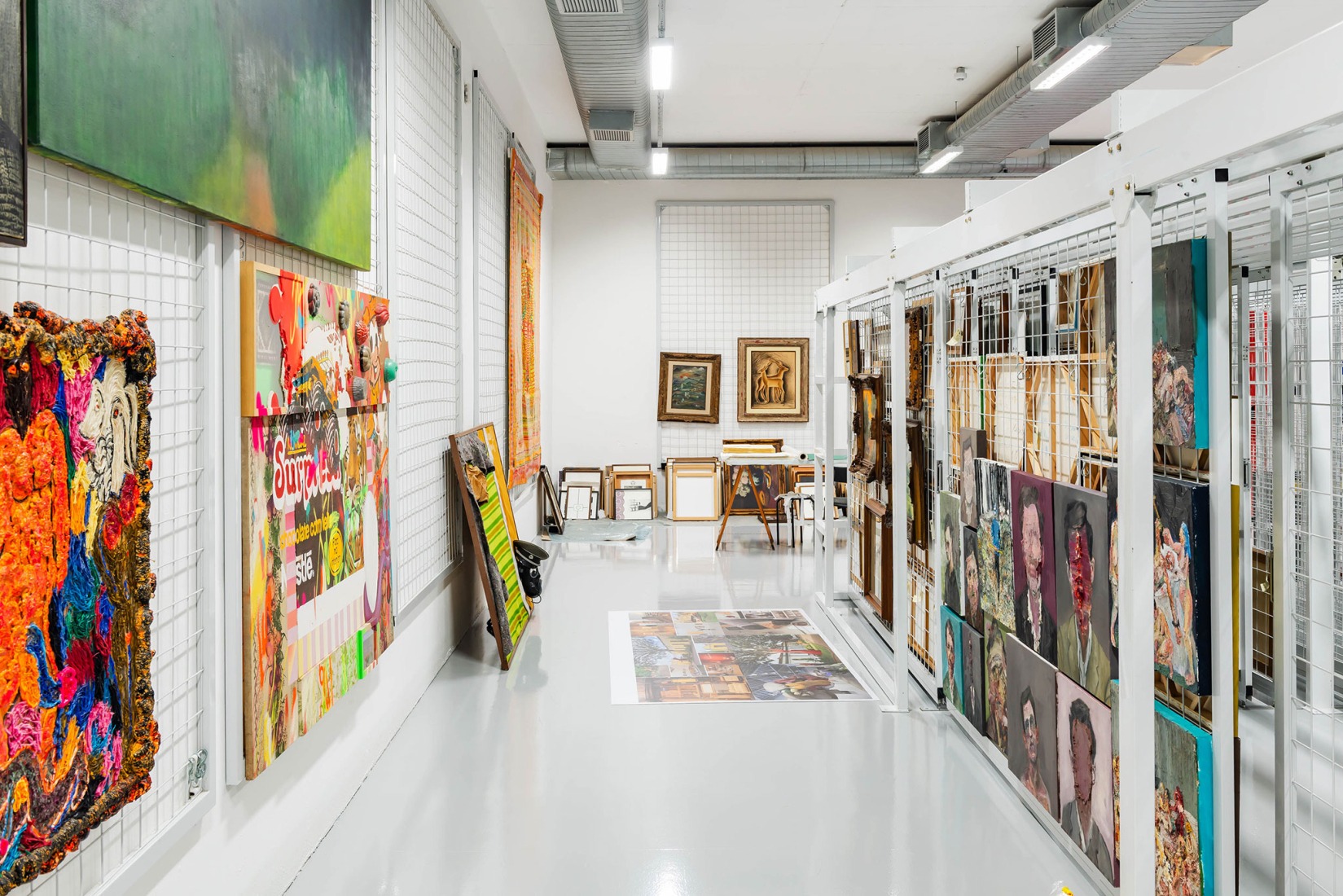Interior view of the Depot F, featuring stored artworks. Fábrica de Arte Marcos Amaro (FAMA) by KAAN. Photograph by Sebastian van Damme.
