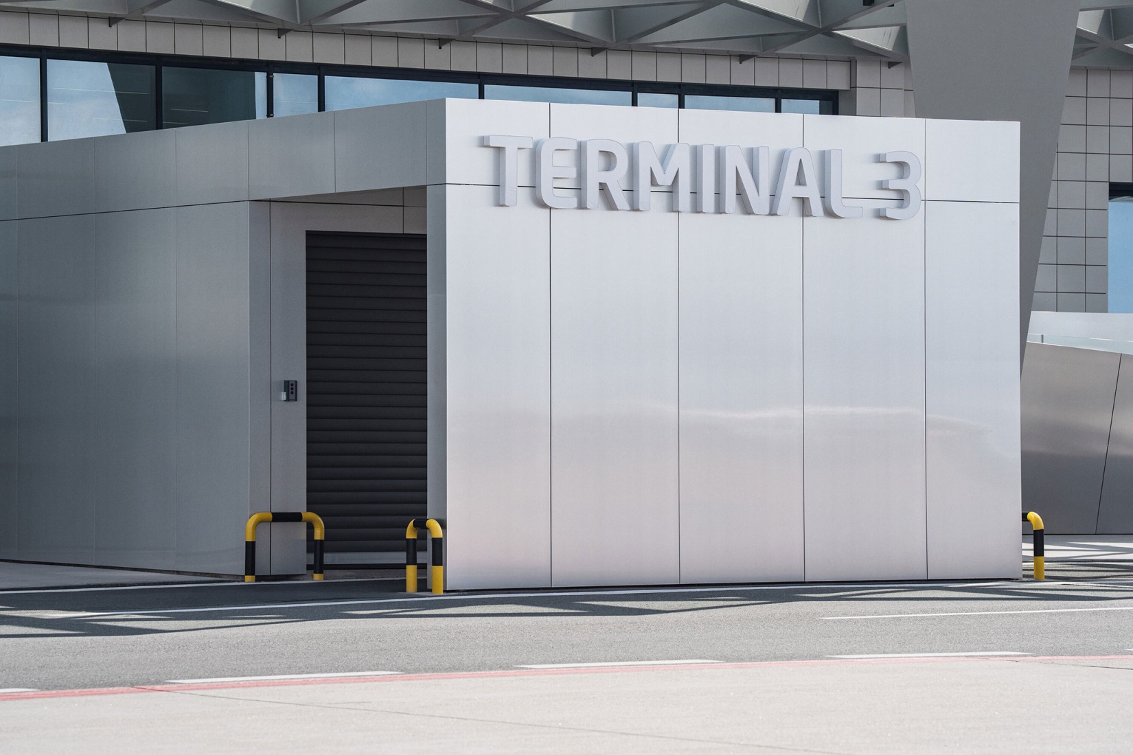 Prague Airport Terminal 3 by ra15. Photograph by Petr Polák.
