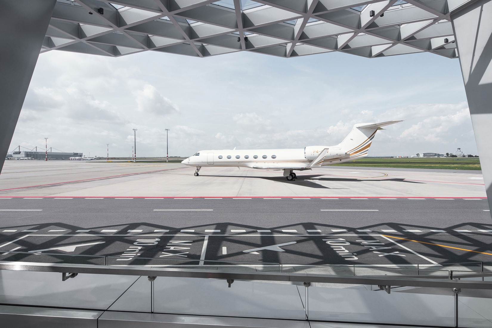 Prague Airport Terminal 3 by ra15. Photograph by Petr Polák.