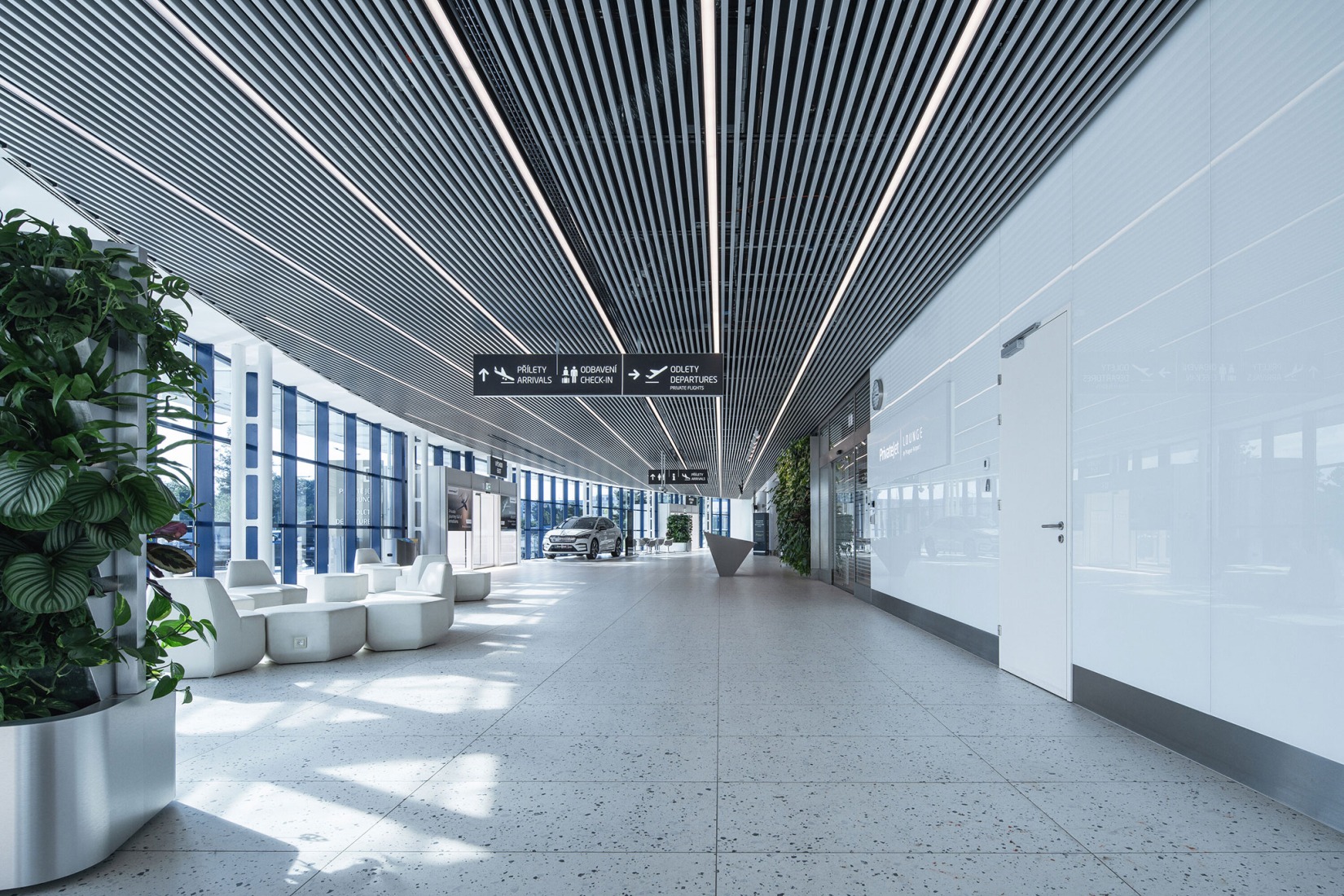 Prague Airport Terminal 3 by ra15. Photograph by Petr Polák.