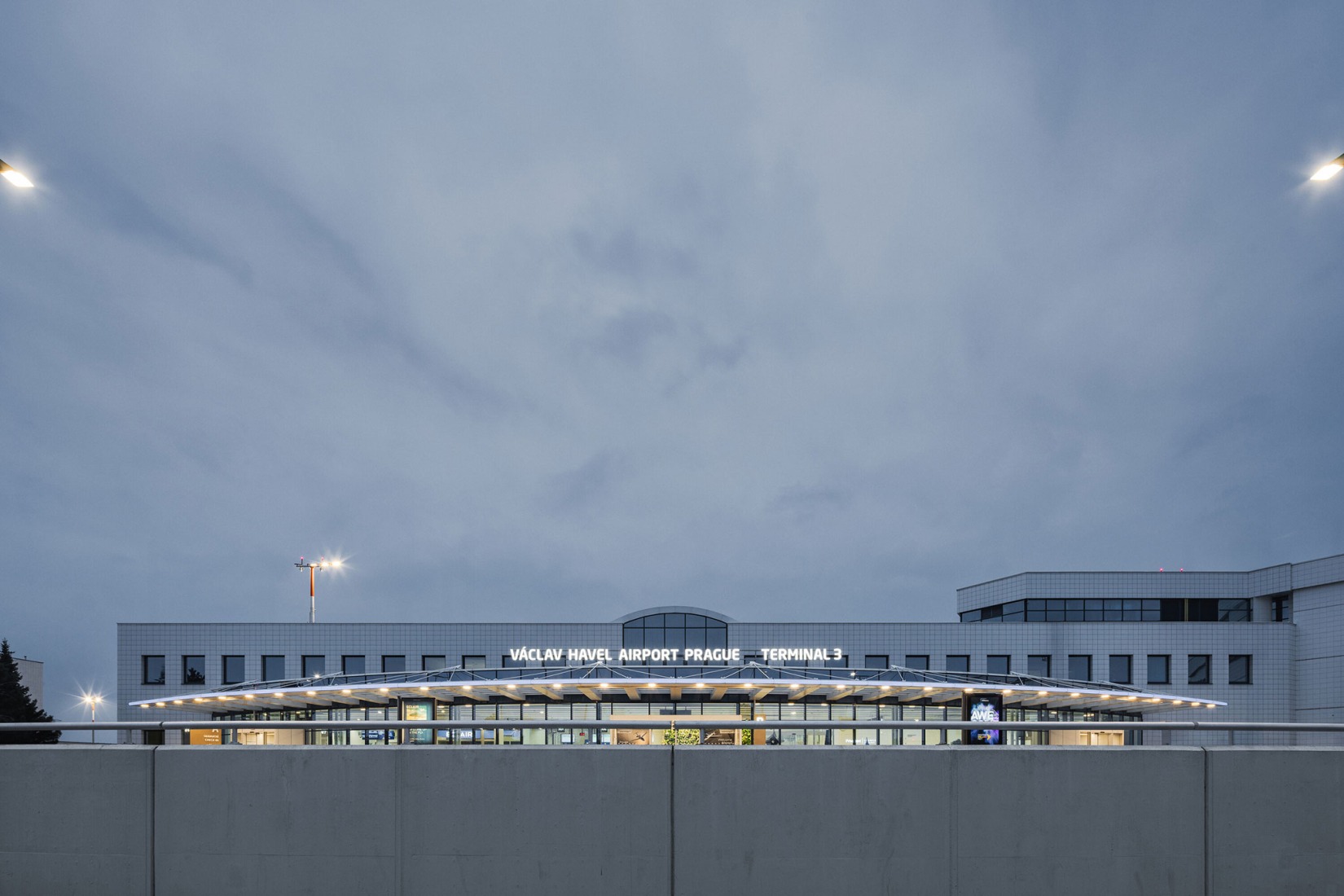 Prague Airport Terminal 3 by ra15. Photograph by Petr Polák.