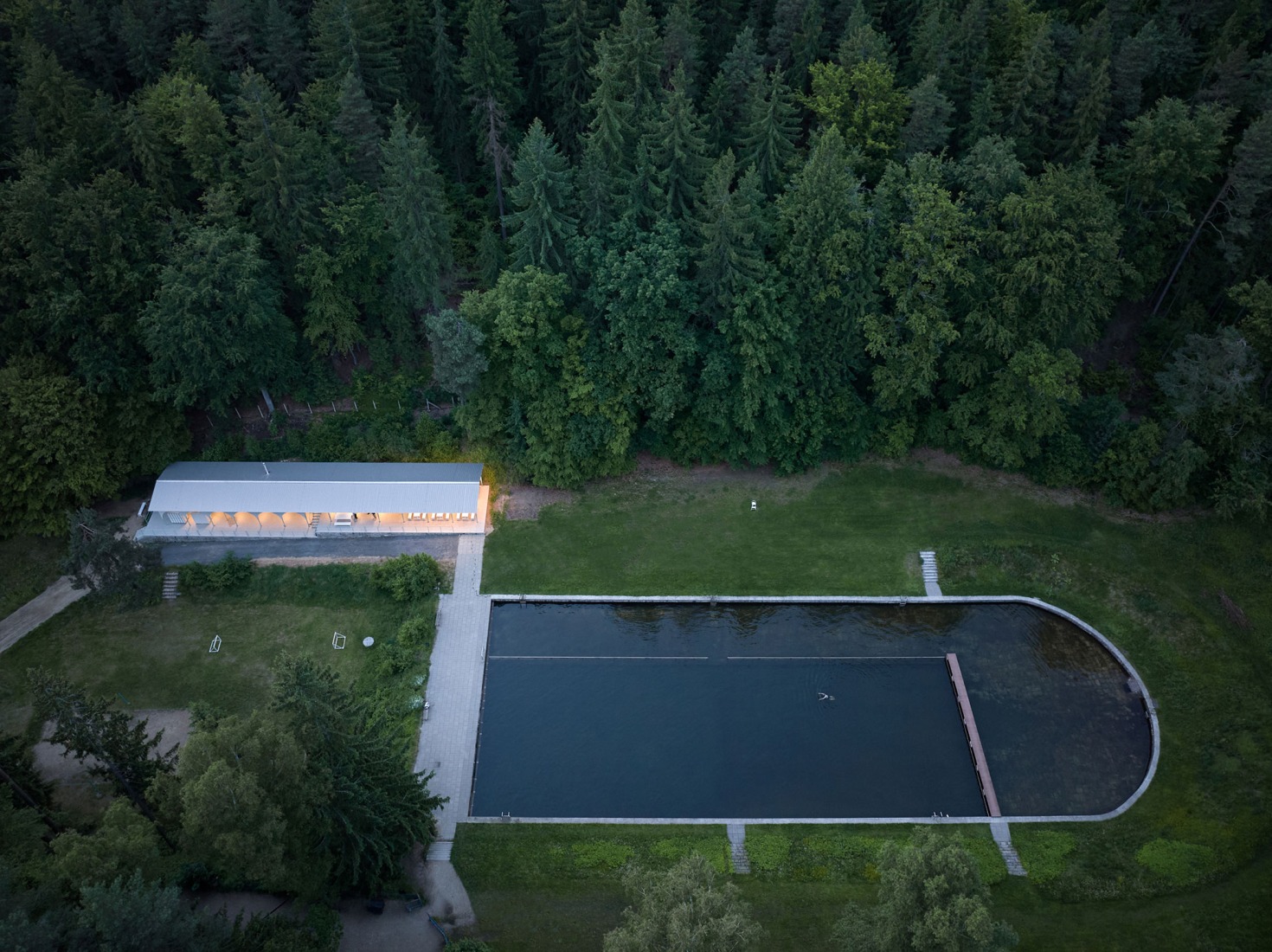Forest Pool by Mjölk architekti + Marie Vondráková. Photograph by BoysPlayNice.
