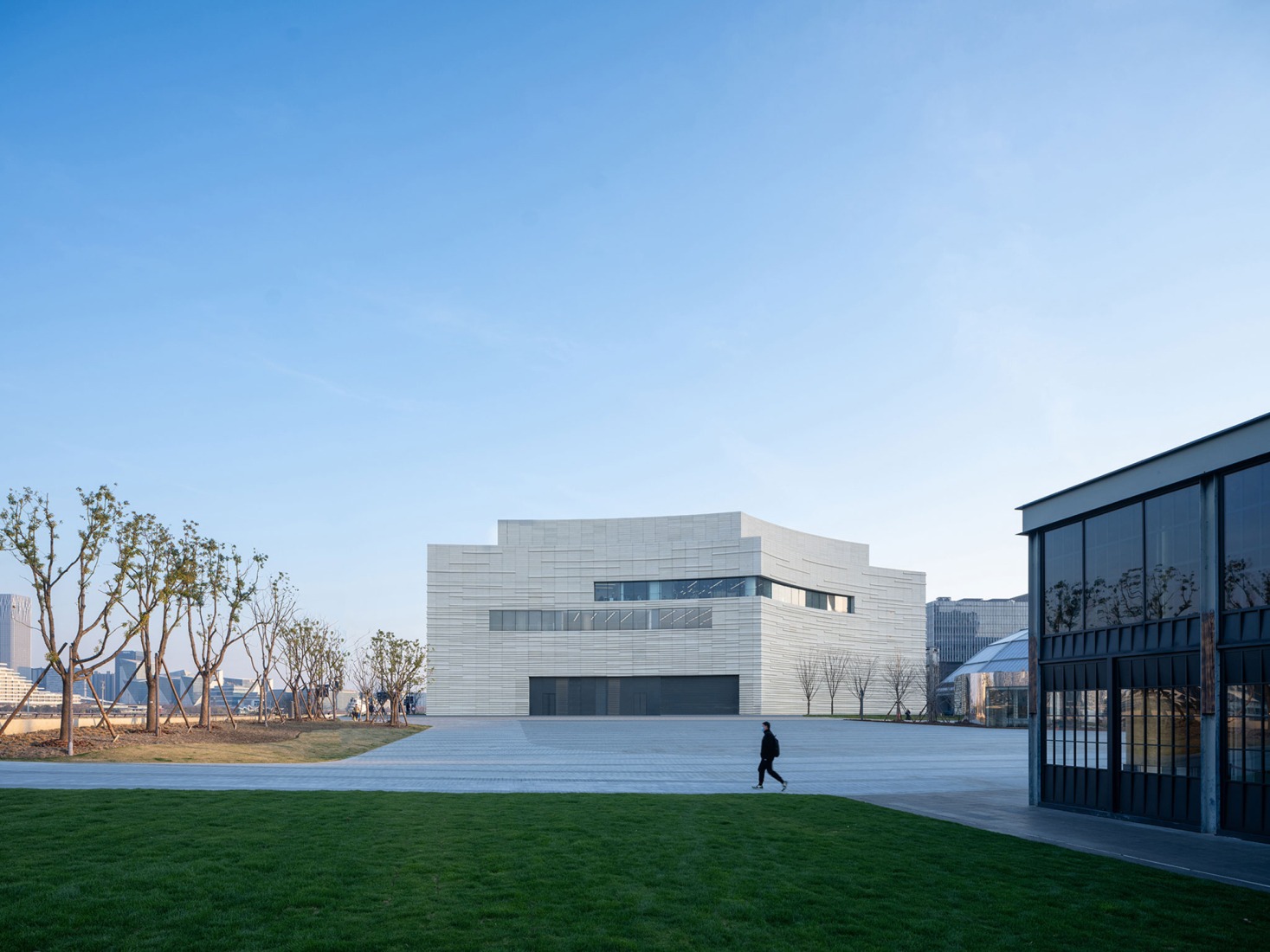 Gran Teatro del West Bund por Schmidt Hammer Lassen Architects. Fotografía por RAWVISION studio.