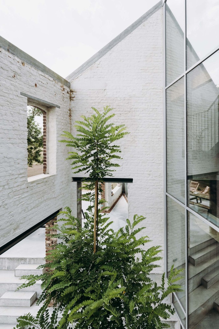 Casa Lyco por OYO Architects. Fotografía por Karen Van der Biest.