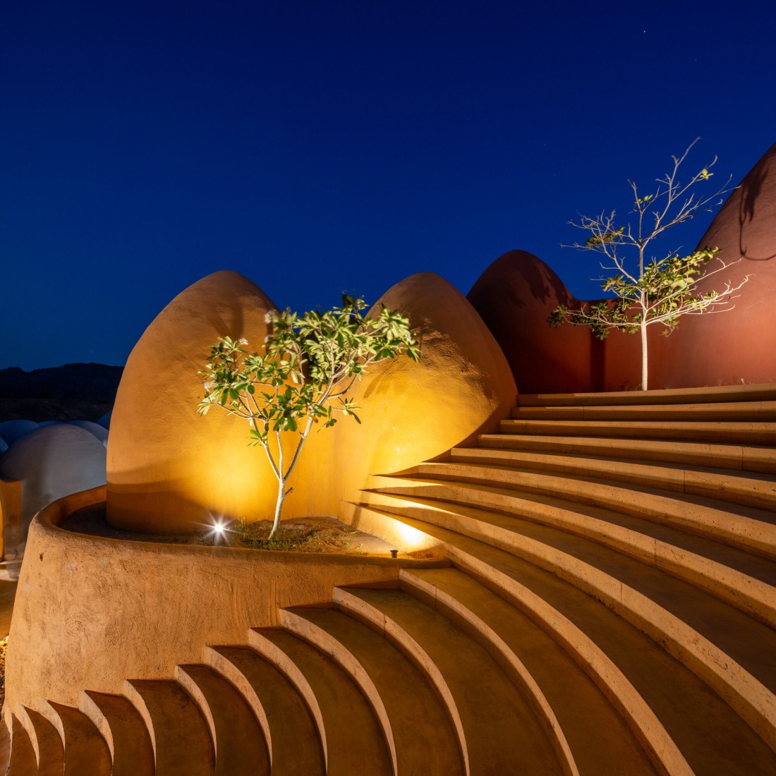 In Majara, four distinct colours, derived from the island's ochre-rich soils, are applied across domes and landscapes as if forming a continuous surface. Majara Residence and Community Redevelopment by ZAV Architects. Photograph by Deed Studio. Image courtesy of Aga Khan Trust for Culture. In Majara, four distinct colours, derived from the island's ochre-rich soils, are applied across domes and landscapes as if forming a continuous surface. Majara Residence and Community Redevelopment by ZAV Architects. Photograph by Deed Studio. Image courtesy of Aga Khan Trust for Culture.