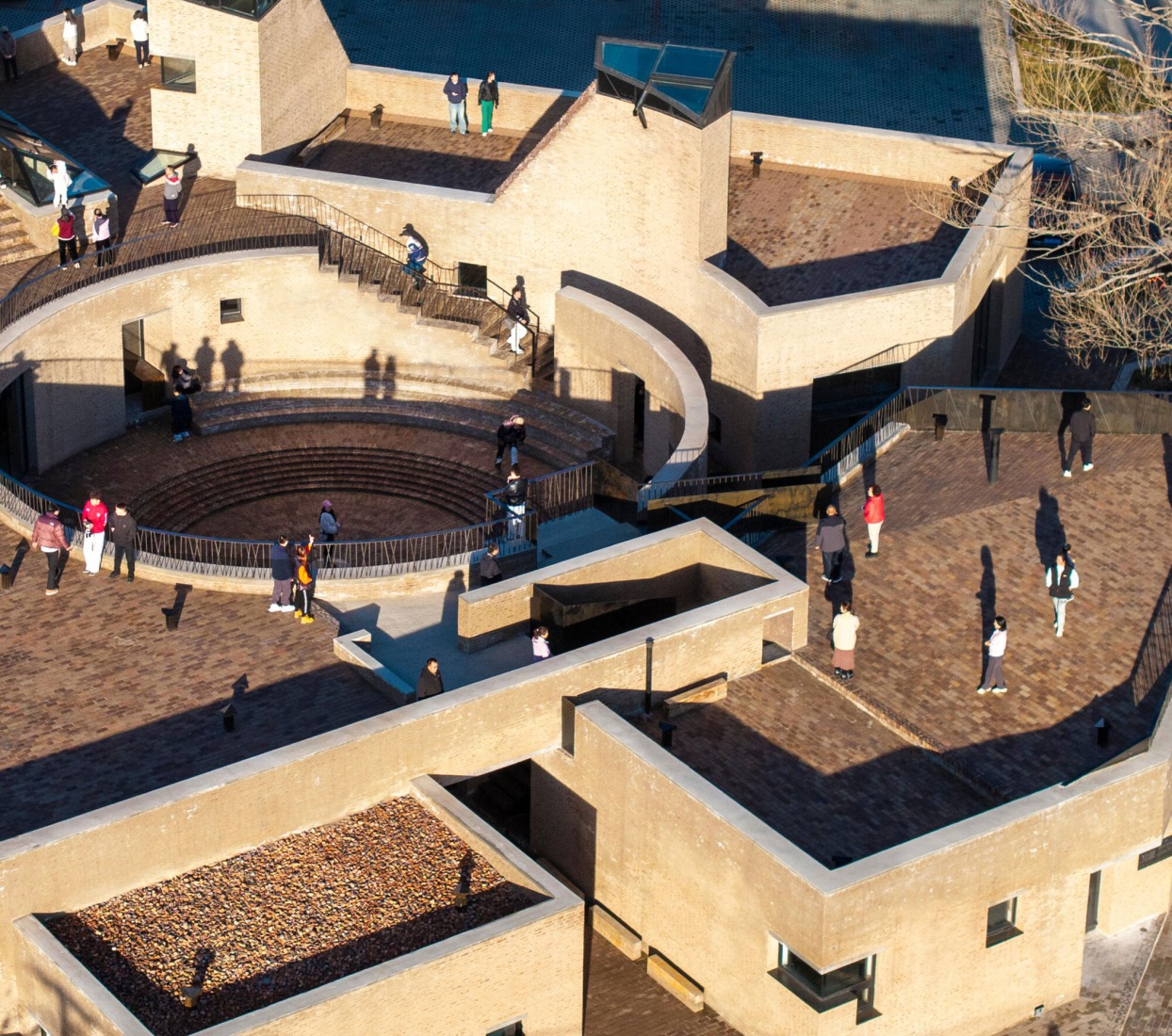 Aerial view of the centre showing the roof and the courtyard. This building is designed around spaces for community activity. Photograph courtesy by Aga Khan Trust for Culture / Dou Yujun (photographer).