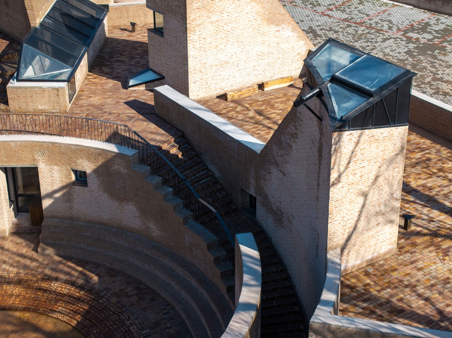 Aerial view of the roof towers. Underground ventilation and passive cooling towers harness natural airflow and thermal mass principles, minimising energy use. Photograph courtesy by Aga Khan Trust for Culture / Dou Yujun (photographer).
