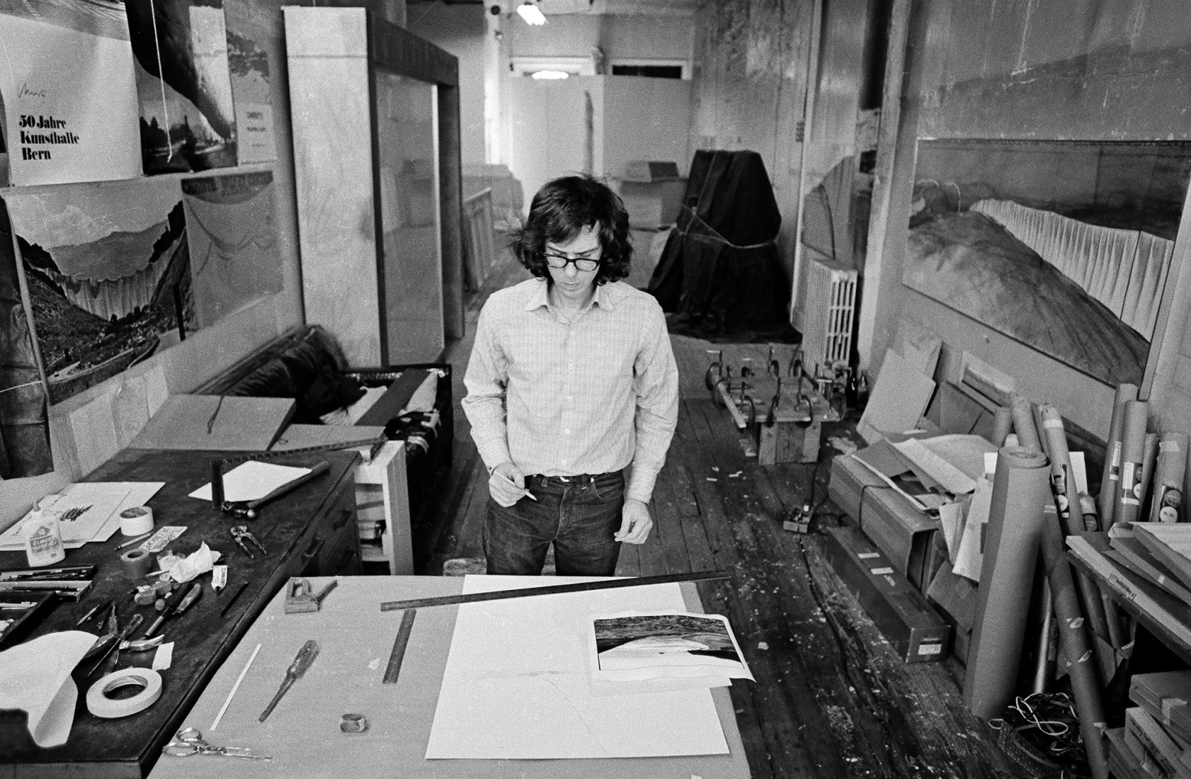 Christo at work in his studio, New York City, 1974. Photograph by Wolfgang Volz. Courtesy by Christo and Jeanne-Claude Foundation. 