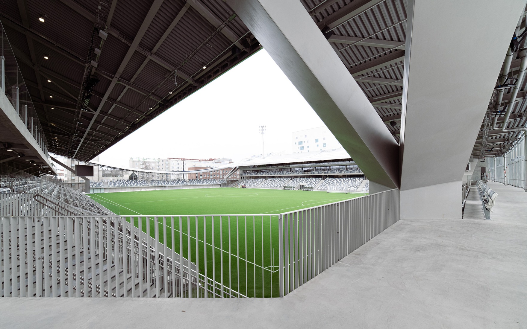 Estadio Tammela por JKMM Architects. Fotografía por Hannu Rytky.