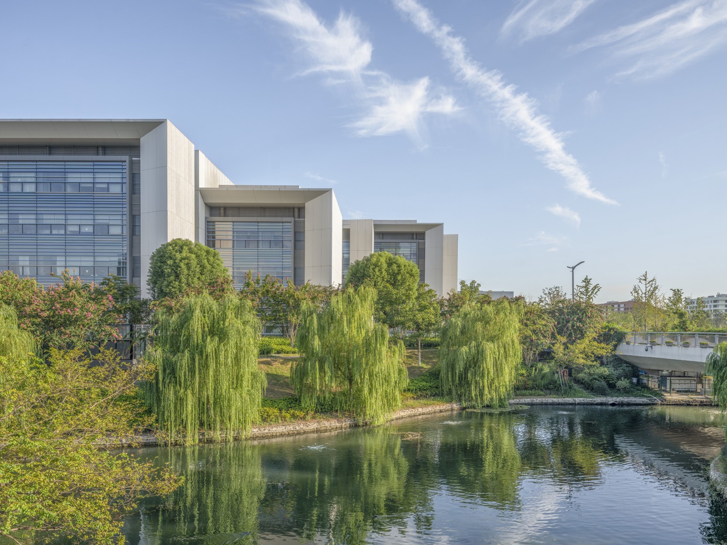 Faculty buildings, water loop. Westlake University by HENN. Photograph by Tian Fangfang.
