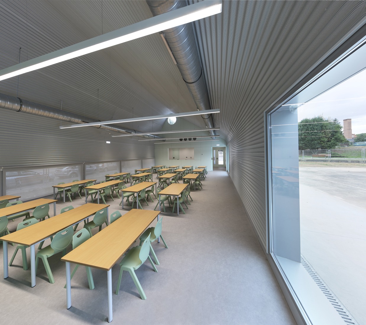 Comedor infantil de Ventanielles por Rogelio Ruiz + Macario G. Astorga. Fotografía por Marcos Morilla.