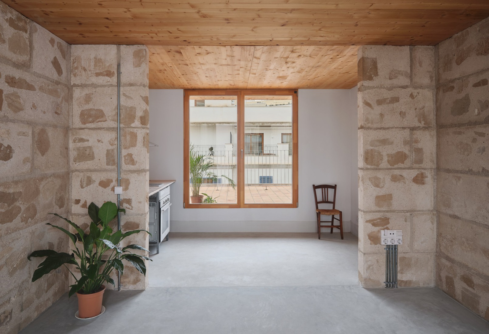 25 viviendas sociales por Harquitectes. Fotografía por Adrià Goula.