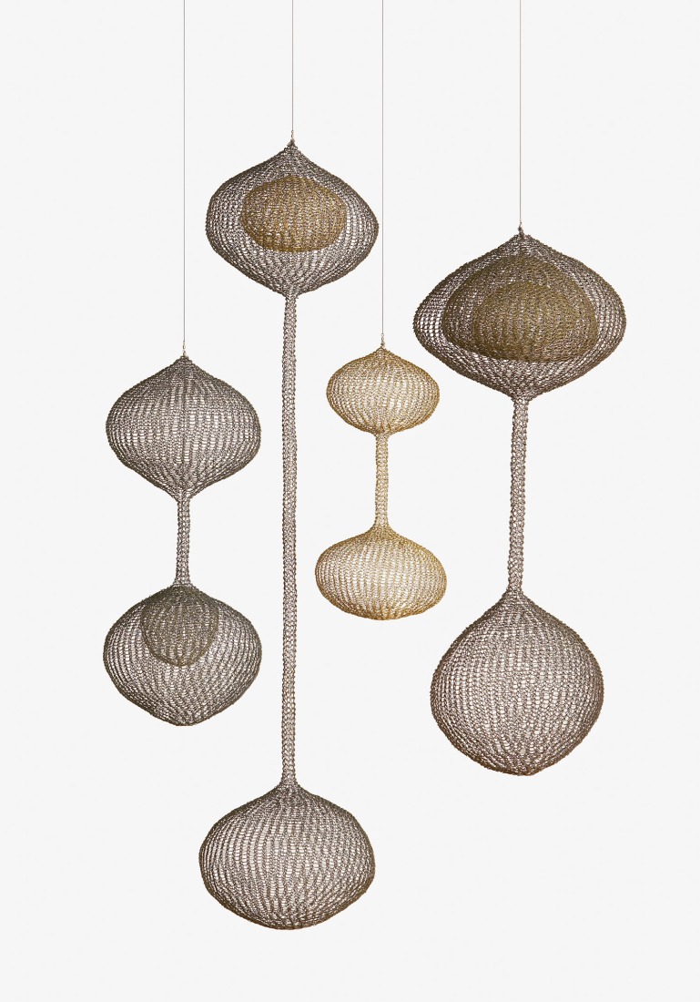 Ruth Asawa. Untitled (S.046a–d, Hanging Group of Four, Two-Lobed Forms, 1961. Copper wire and brass; (a): 152.4 × 43.2 × 17.8 cm; (b): 53.3 × 30.5 × 30.5 cm; (c): 81.3 × 33 × 33 cm; (d): 104.1 × 40.6 × 40.6 cm. Collection of Diana Nelson and John Atwater. Pledged gift to the San Francisco Museum of Modern Art. Copyright 2026 Ruth Asawa Lanier, Inc., courtesy of David Zwirner. Photograph by Laurence Cuneo.