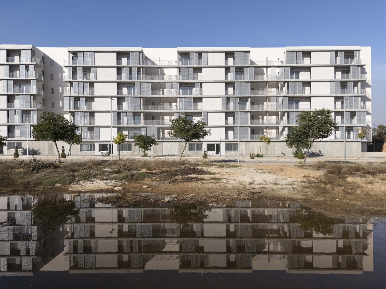 125 viviendas de protección oficial por Daroca Arquitectos + Práctica Arquitectura. Fotografía por Fernando Alda.  
