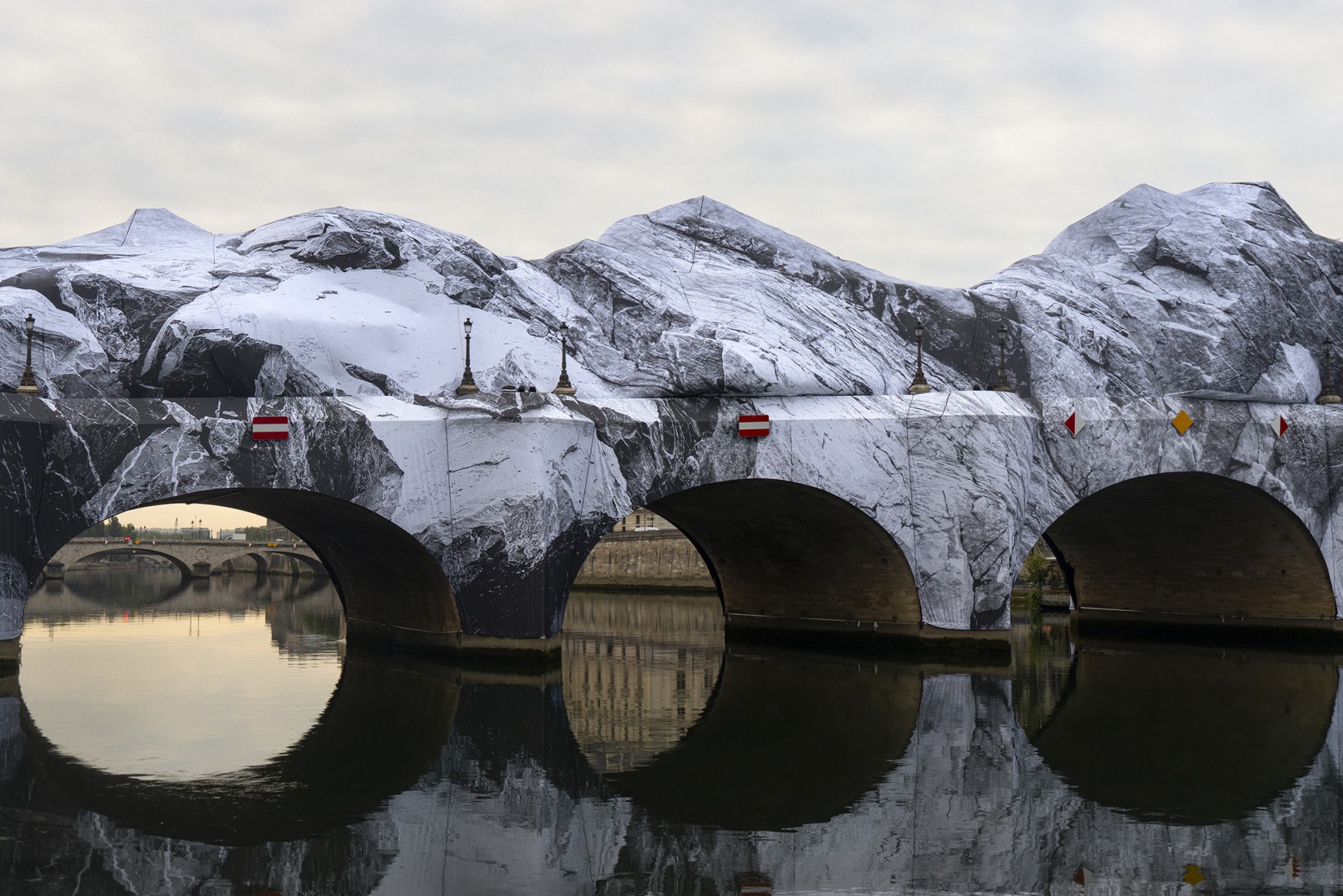 JR. "La Caverne du Pont Neuf". 2026. Photograph courtesy by Atelier JR.
