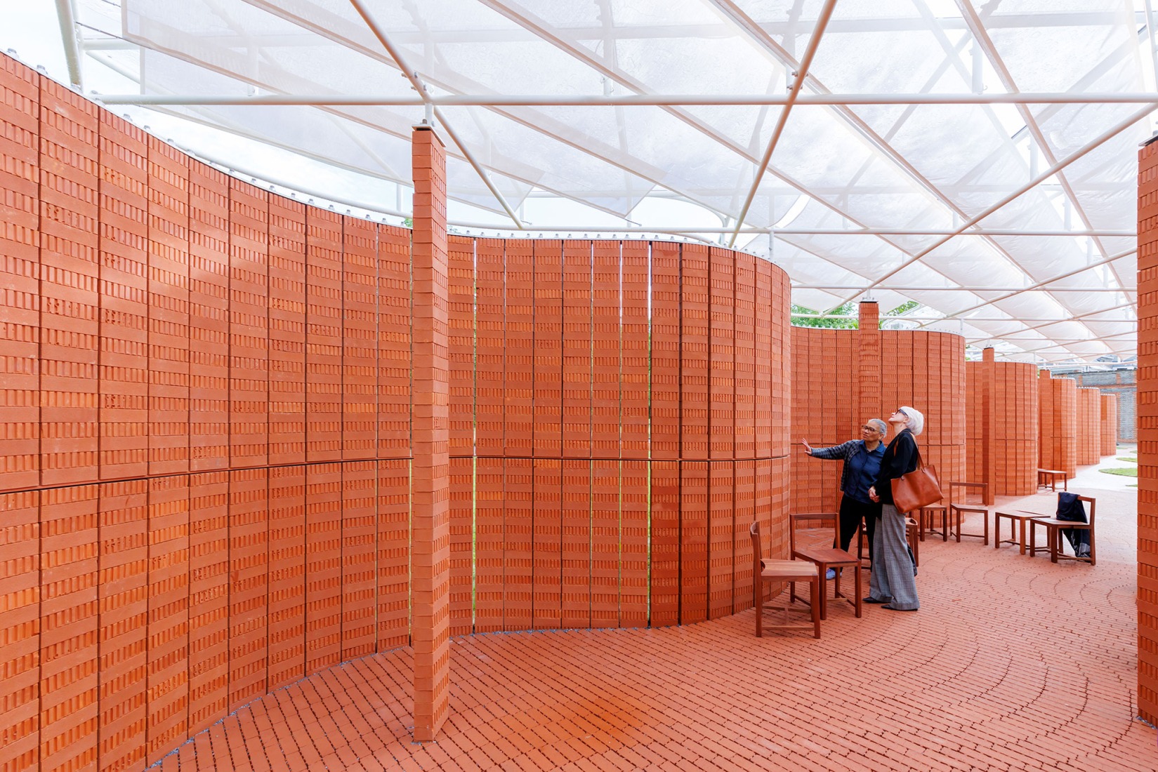 Interior view. Serpentine Pavilion 2026 a serpentine, designed by Isabel Abascal and Alessandro Arienzo, LANZA atelier. Photograph by Iwan Baan, Courtesy Serpentine.
