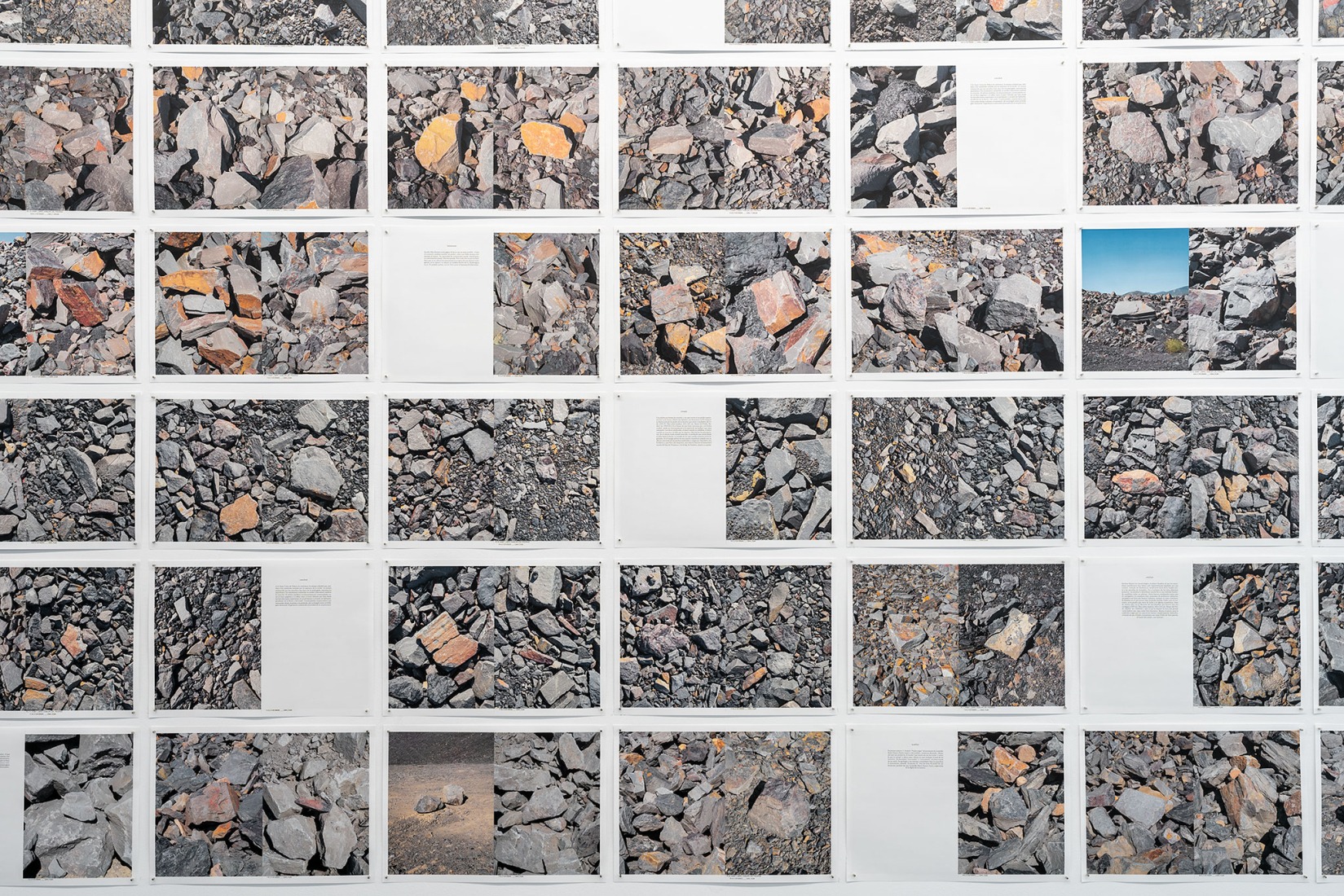 Talking about stones. Mineral lexicon (Installation detail), 2024. 4/4 color digital offset print on paper. Installation of 172 sheets, 31.7x46cm each. Courtesy of Jorge Yeregui, VEGAP, Madrid, 2026.