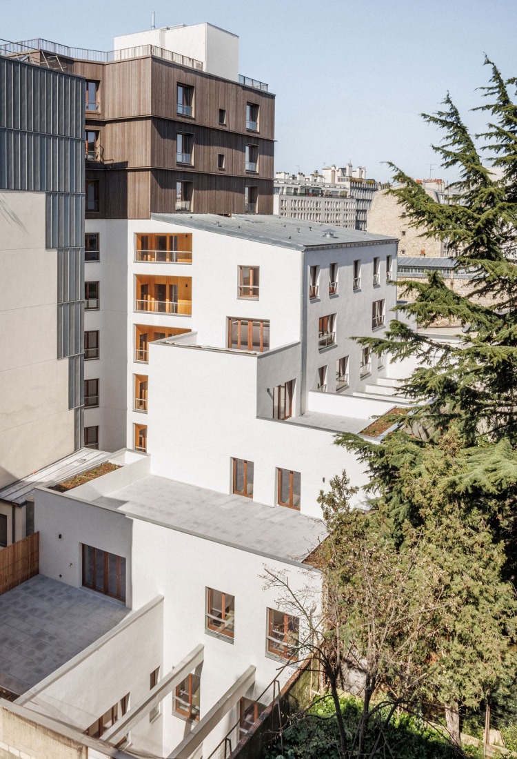 Garage Building into 63 Apartment Building by Atelier Tequi Architects. Photograph by Schnepp Rengu.