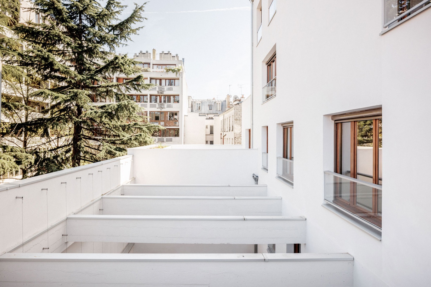 Garage Building into 63 Apartment Building by Atelier Tequi Architects. Photograph by 11h45 - Florent Michel.