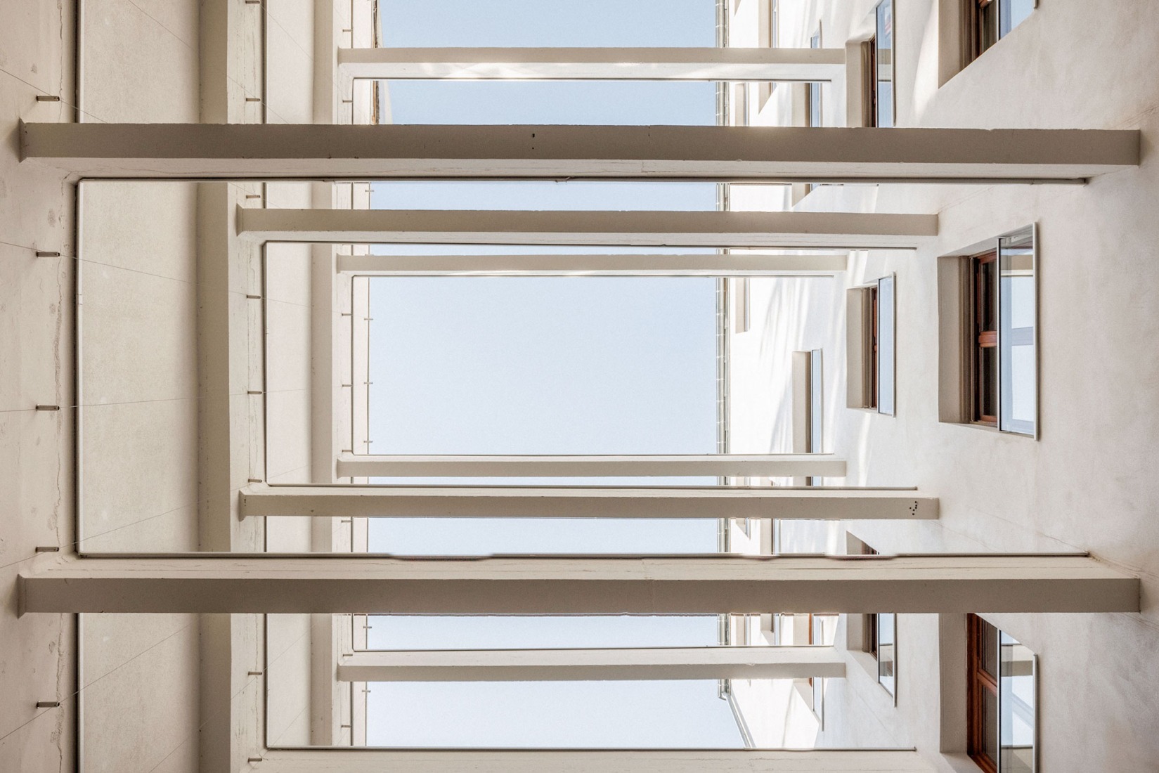 Garage Building into 63 Apartment Building by Atelier Tequi Architects. Photograph by 11h45 - Florent Michel.