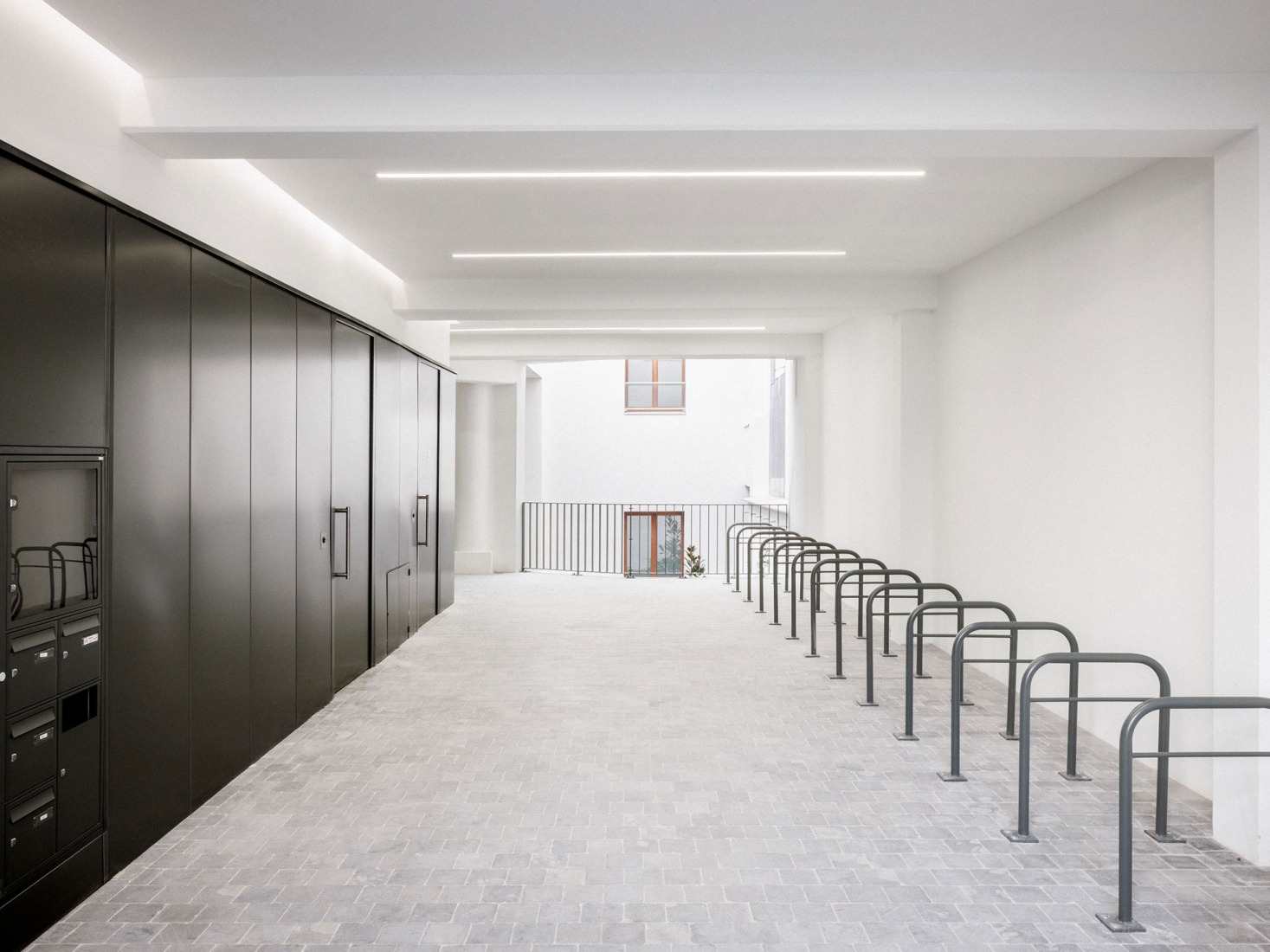 Garage Building into 63 Apartment Building by Atelier Tequi Architects. Photograph by 11h45 - Florent Michel.