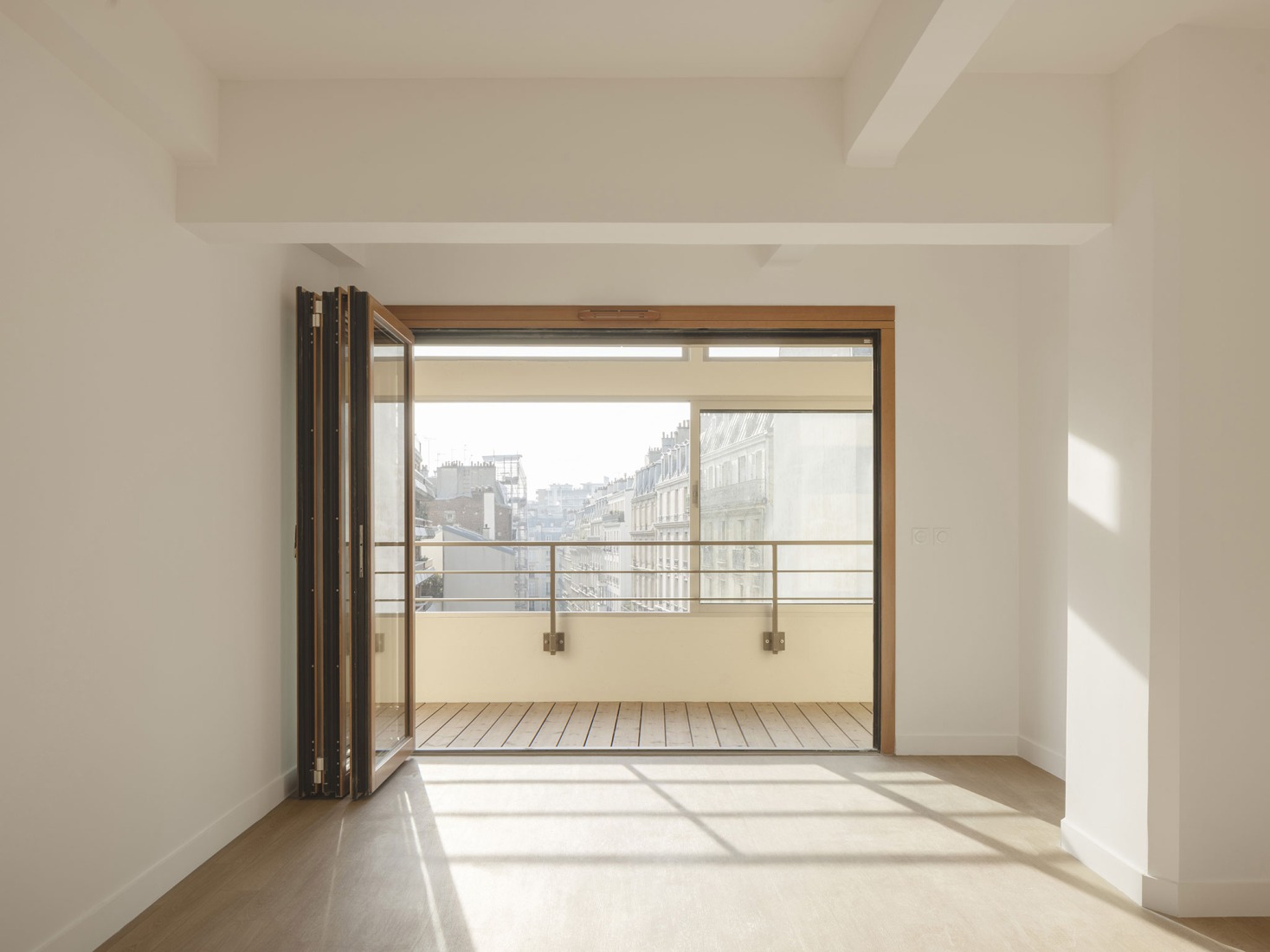 Garage Building into 63 Apartment Building by Atelier Tequi Architects. Photograph by Schnepp Rengu.