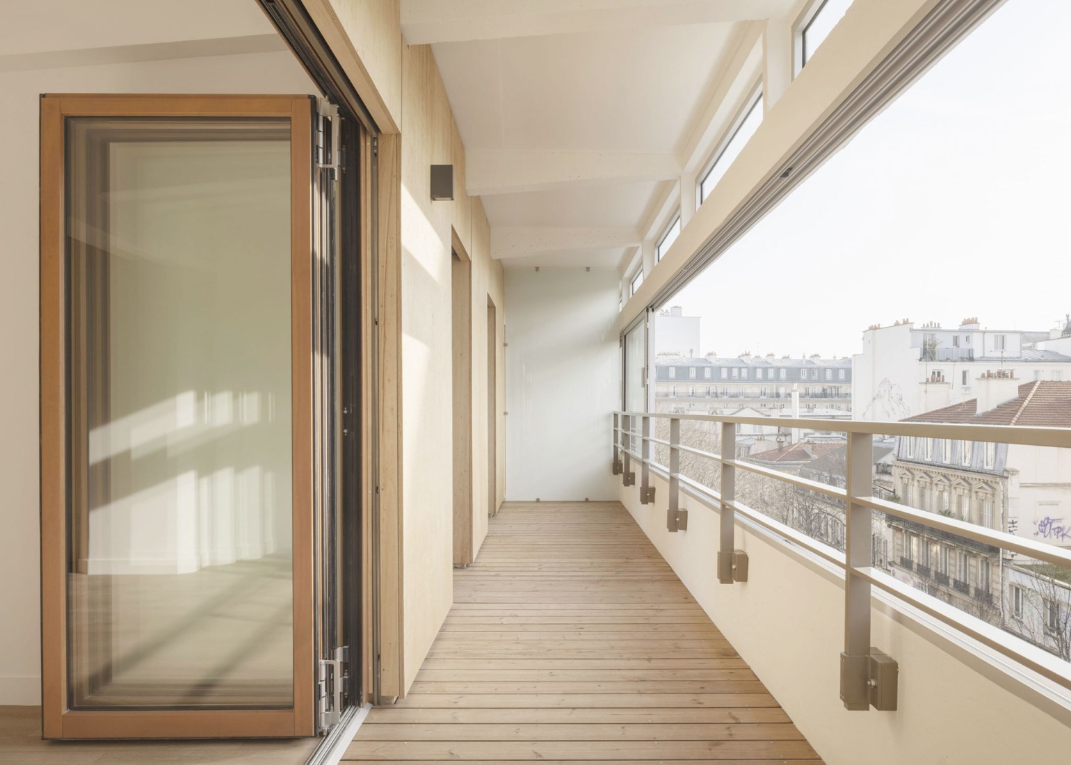 Garage Building into 63 Apartment Building by Atelier Tequi Architects. Photograph by 11h45 - Florent Michel.