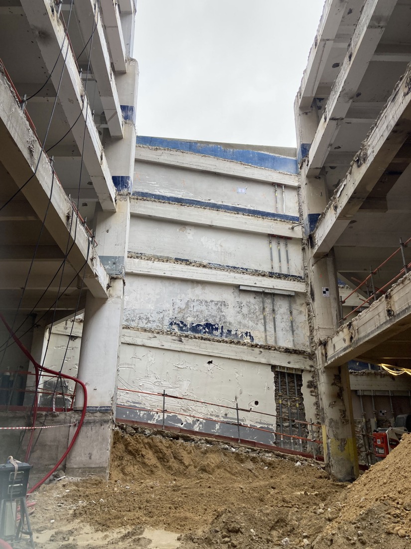 The building prior to its reconstruction from a garage into a 63 Apartment Building, by Atelier Tequi Architects. Photograph by Atelier Tequi Architects.