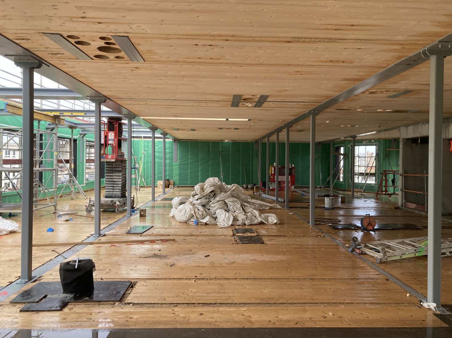 The building prior to its reconstruction from a garage into a 63 Apartment Building, by Atelier Tequi Architects. Photograph by Atelier Tequi Architects.