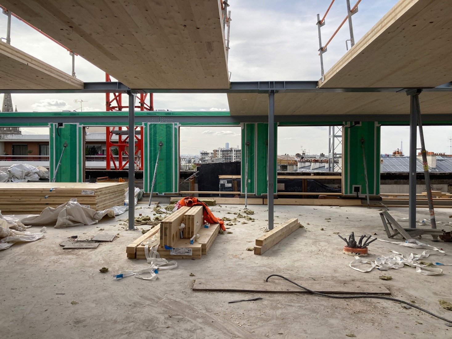 The building prior to its reconstruction from a garage into a 63 Apartment Building, by Atelier Tequi Architects. Photograph by Atelier Tequi Architects.