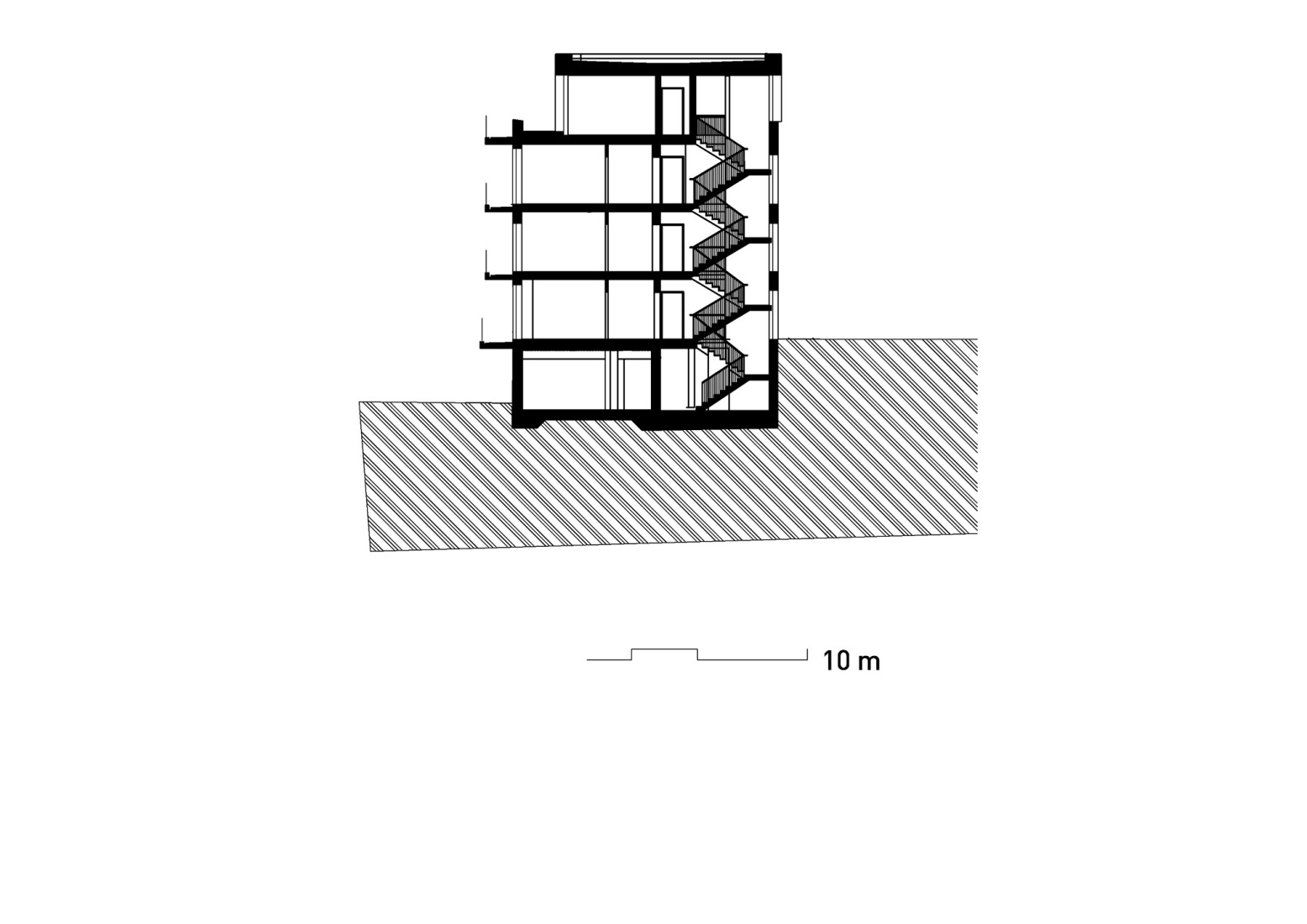 Section. Mánesova Apartment Building by OK PLAN ARCHITECTS.