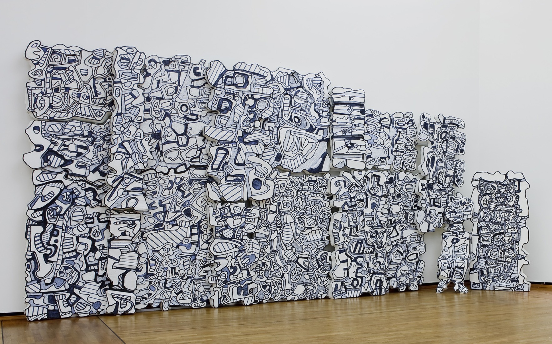 Jean DUBUFFET. Le Mur bleu, 1966–1969. Photograph by Georges Poncet. Courtesy of  Renault Fund for Art and Culture, Dubuffet Foundation - Paris, ADAGP 2026.