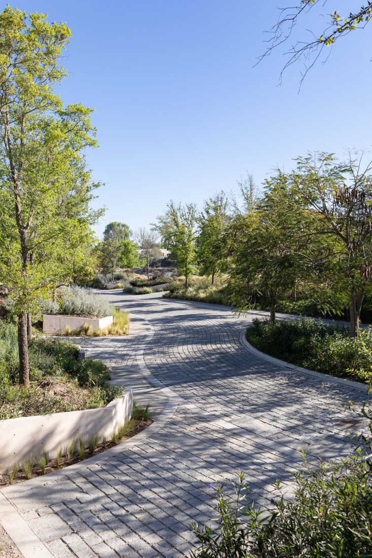 Detail of cobblestone streets. Bosquet by Perimetral + AE Arquitectos. Photograph by Jesús López Cinco.