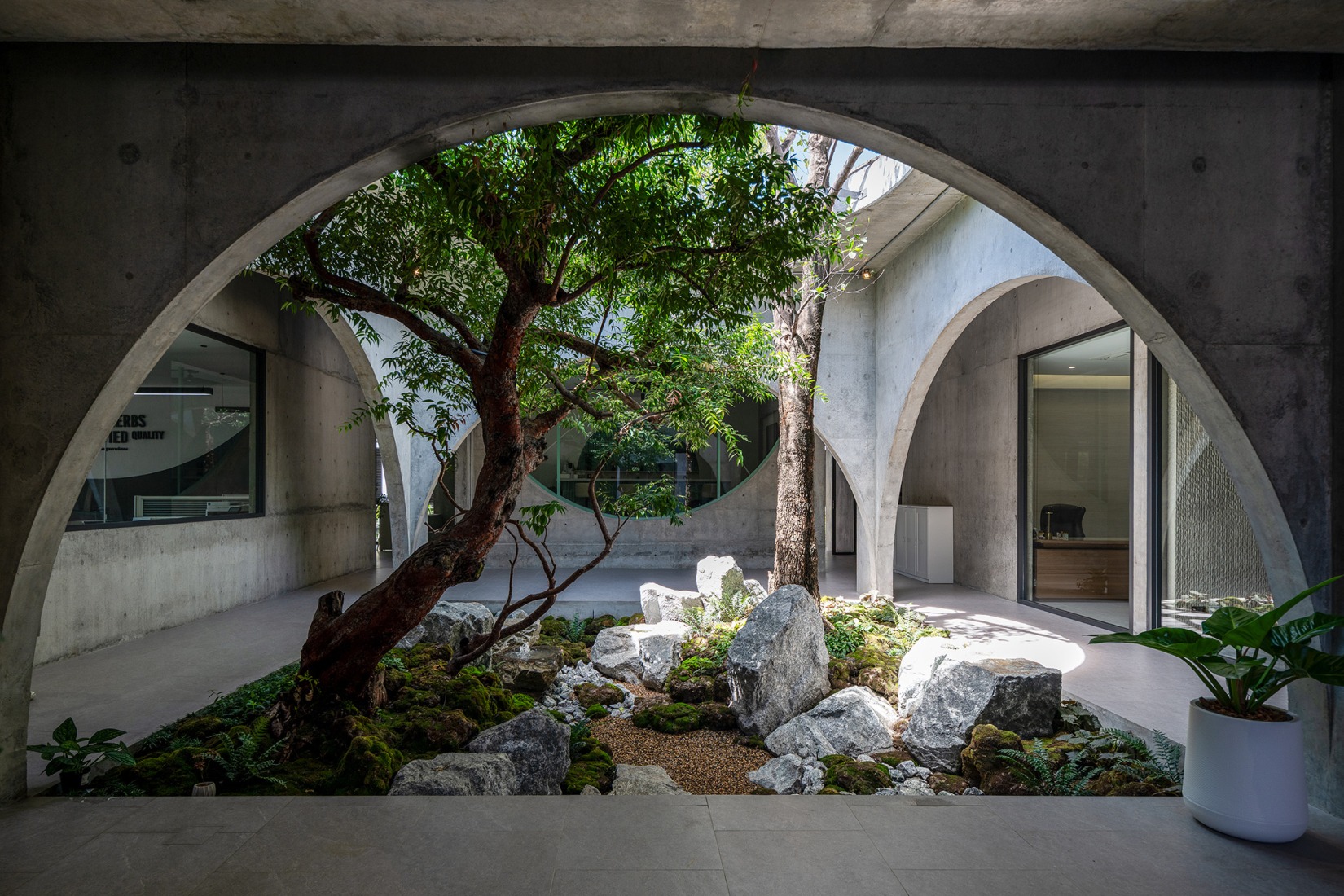 Courtyard. Novolife HQ Office by Studio Krubka. Photograph by Weerapon Singnoi.