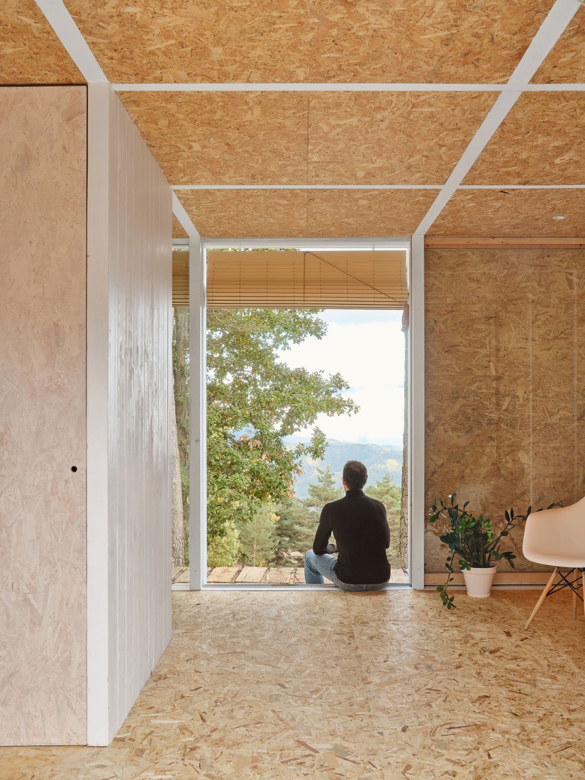 Casa Bosc por Ágora Arquitectura. Fotografía por Adrià Goulà.