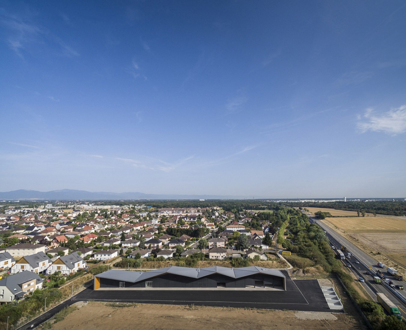 Aerial view. Technical Centre in Rixheim by MFA Architects and Nicola Martinoli. Photography © Fernando Guerra