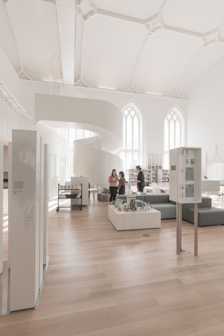 The library in the Wesley temple. Maison de la littérature (House of Literature) by Chevalier Morales Architectes. Photograph by Chevalier Morales Architectes.