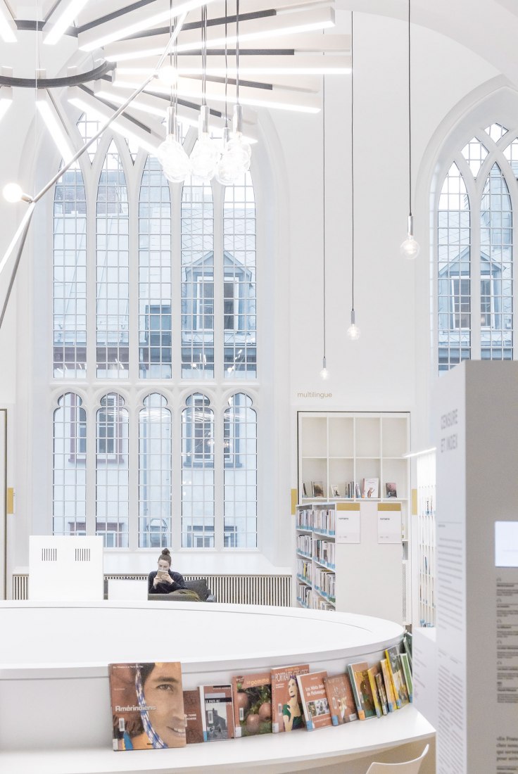 The library in the Wesley temple. Maison de la littérature (House of Literature) by Chevalier Morales Architectes. Photograph by Chevalier Morales Architectes.